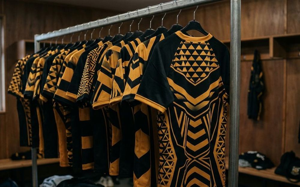 Custom sublimated rugby and football shirts in black and gold